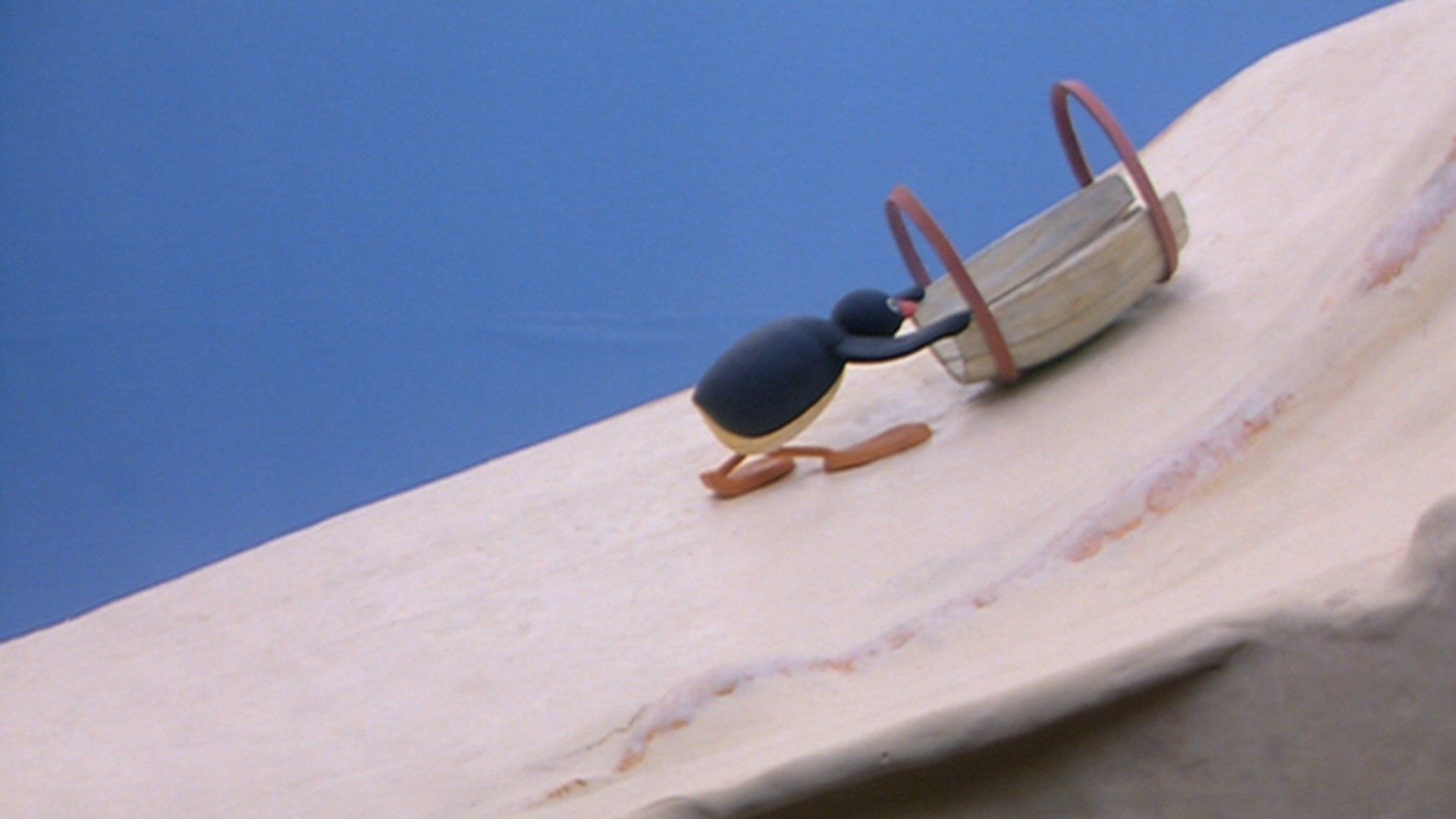 13. Pingu på skidor