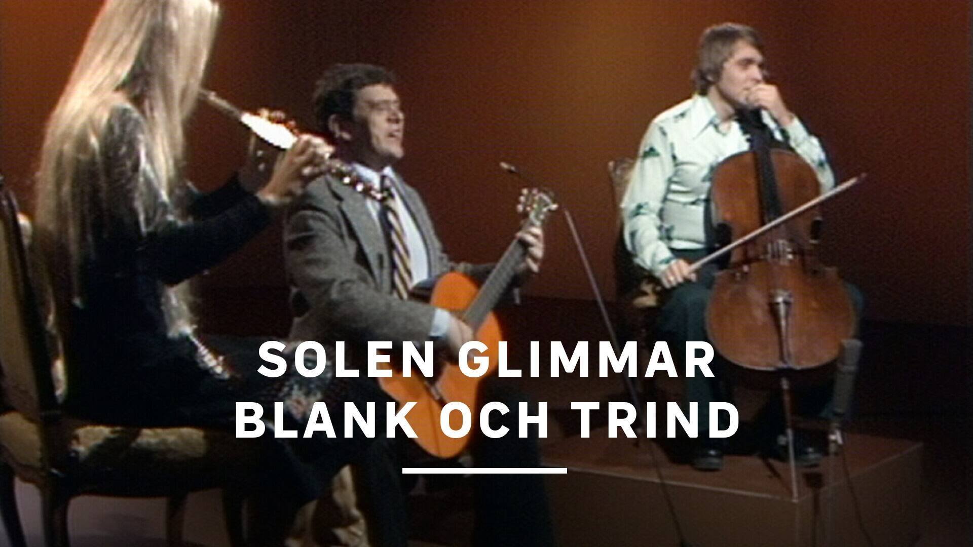 Solen glimmar blank och trind